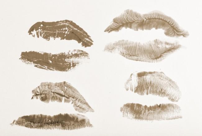 Imprint of lipstick passionate female lips closeup shot 