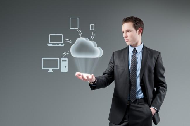 Cloud computing idea concept. Man holding cloud Hologram. 