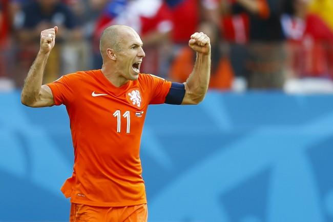 Zdjęcie SAO PAOLO, BRAZIL &#8211; JUNE 23, 2014: Arjen Robben of the Netherlands celebrates during the World Cup Group B game between the Netherlands and Chile at the Arena Corinthians. NO USE IN BRAZIL. pochodzi z serwisu ShutterStock 