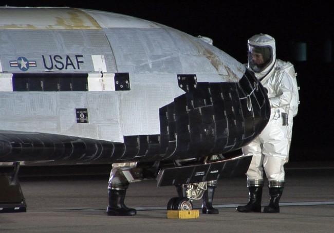 The_X-37B_OTV_is_inspected_after_landing_at_Vandenberg_Air_Force_Base,_California 