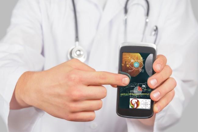 Doctor Is Pointing On Mobile Phone, Copyspace 